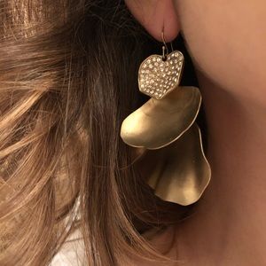 Cascading gold earrings with rhinestones